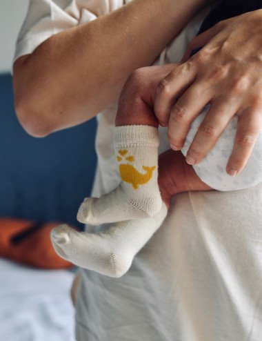 Three Warm newborn socks...